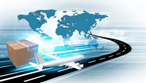 An airport runway with multiple cargo planes loading under a sunset.